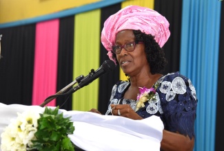 Chair, National Child Month Committee (NCMC), Dr. Pauline Mullings, addressing the NCMC’s annual Youth Academic Achievement Awards ceremony, held recently at the Caenwood Centre in Kingston

