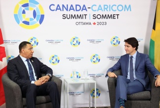 Prime Minister, the Most Hon. Andrew Holness, converses with Prime Minister of Canada, Rt. Hon. Justin Trudeau, on the final day of the Canada-CARICOM summit in Ottawa, Canada on Thursday (October 19).
