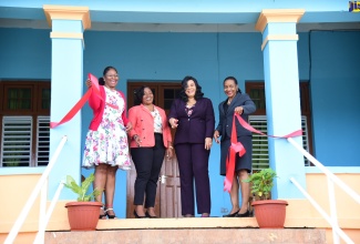 Minister of State in the Ministry of Education and Youth, Hon. Marsha Smith (right) along with (from left) Executive Director, Transformation Implementation Unit (TIU), Maria Thompson Walters; Manager, Muirton Boys’ Home, Shanae Walsh Webber; and Chief Executive Officer, Child Protection and Family Services Agency (CPFSA), Laurette Adams- Thomas, officially open the Sensory Room at the Muirton Boys’ Home in Portland on Friday (November 3). The TIU has partnered with the CPFSA to assist in the modernisation of the Agency’s operation using information and communication technology (ICT) as a key enabler to achieve its goals and objectives.  The project also includes auxiliary support for other key areas of the Agency to allow it to have a greater impact on the children served and the society in general. This support aims to provide enhanced therapeutic environments for children to include those with special needs and to increase the reach of psychology screening and intervention programmes. The sensory room at Muirton Boys’ Home is one such initiative.