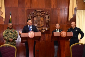 Prime Minister, the Most Hon Andrew Holness, addresses Wednesday’s (November 8) post-Cabinet press briefing at Jamaica House where he announced the declaration of a State of Public Emergency (SOE) for the parish of St. James. Joining the Prime Minister (from left) are Acting Chief of Defence Staff, Brigadier Markland Lloyd; Deputy Prime Minister and Minister of National Security, Hon. Dr. Horace Chang; and Commissioner of Police, Major General Antony Anderson.