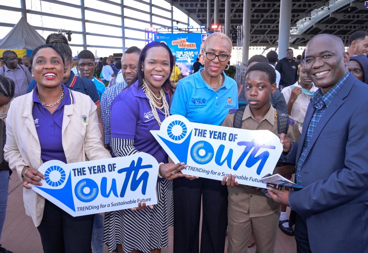 Education and Youth Minister, Hon. Fayval Williams (centre), with (from left) Acting Senior Director in the Youth Adolescent Division in the Ministry, Yanique Willaims; Permanent Secretary in the Ministry, Dr. Kassan Troupe; grade seven Pembrooke Hall High School student, Junior Johnson; and Joint United Nations Programme on HIV/AIDS (UNAIDS) Multi- Country Director, Amenyah Richard. The event was the launch of National Youth Month 2023 on November 3 at the Half -Way Tree Transport Centre in Kingston.