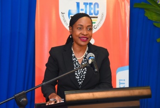 Minister of State in the Ministry of Education and Youth, Hon. Marsha Smith, delivers the keynote address during a ceremony for the presentation of certificates of registration to tertiary institutions, held on Wednesday (November 29) at the Courtleigh Hotel in New Kingston.