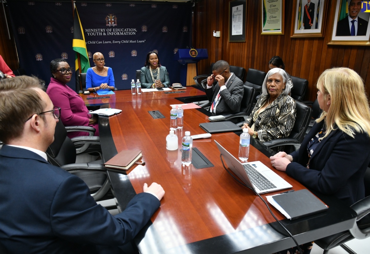 Minister of Education and Youth, Hon. Fayval Williams (third left) and Permanent Secretary in the Ministry, Dr. Kasan Troupe (fourth left), lead a meeting with representatives from City & Guilds, who visited the Ministry’s Heroes Circle offices on November 29.

 