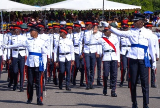 New Jamaica Constabulary Force (JCF) constables perform a march past at the passing out parade held on Wednesday (November 29), at the National Police College of Jamaica in Twickenham Park, St. Catherine.