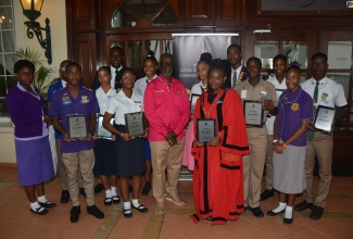 Minister of Local Government and Community Development, Hon. Desmond McKenzie (centre), with Youth Mayors from Jamaica’s 14 Municipal Corporations during the Local Government & Community Month 2023 Youth Mayors’ Forum, held at the Grand Bahia Principe Hotel in Runaway Bay, St. Ann, on Thursday, November 16.