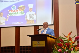President of the Jamaica Hotel and Tourist Association (JHTA), Robin Russell, addresses the launch of the rebranded Team Jamaica Training Programme at the Montego Bay Convention Centre in Rose Hall, St James, on Thursday (November 16).