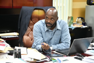 Acting Director General of the Office of Disaster Preparedness and Emergency Management (ODPEM), Richard Thompson, speaks with JIS News at his New Kingston offices recently.

 