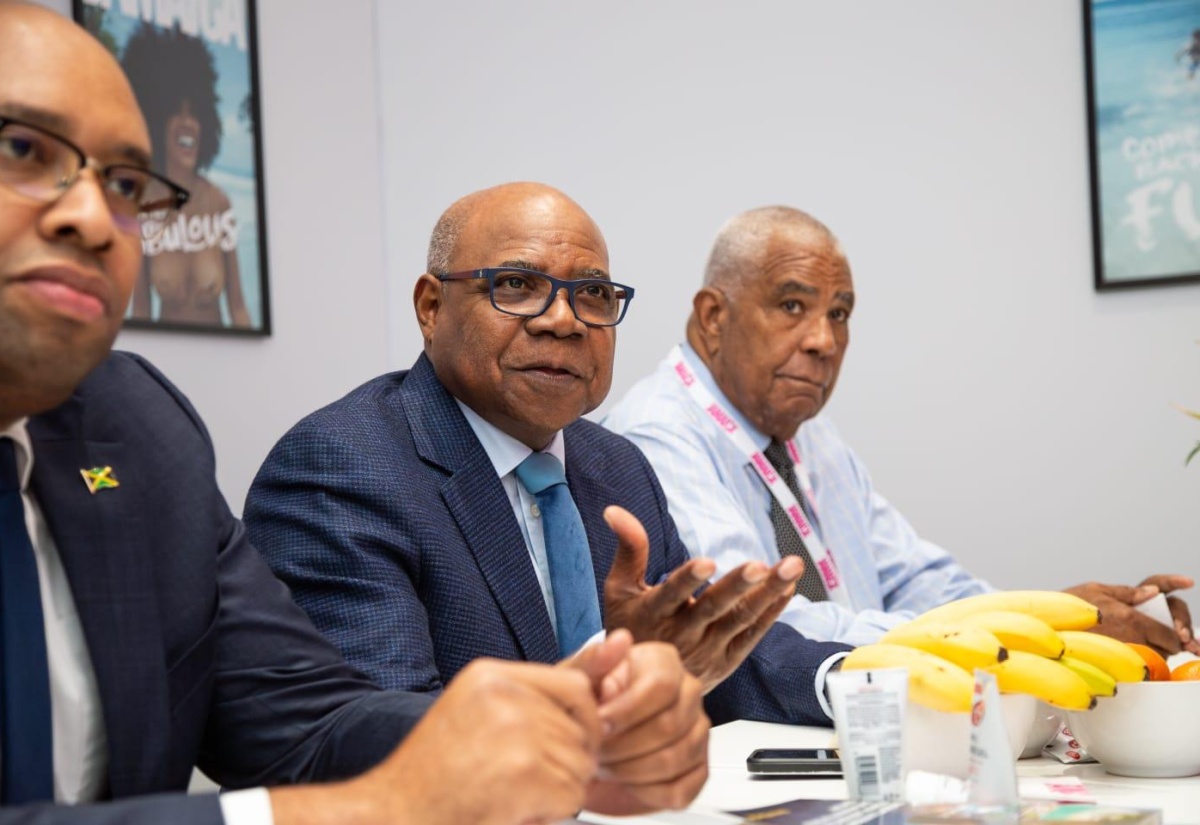 Tourism Minister, Hon. Edmund Bartlett (centre), makes a point at a stakeholders meeting at the World Travel Market in London, England, recently. He is flanked by Chairman of the Jamaica Tourist Board, John Lynch (right) and Senior Advisor and Strategist in the Ministry of Tourism, Delano Seiveright.

