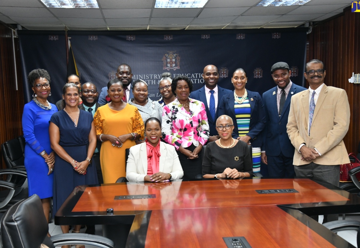 Minister of Education and Youth, Hon. Fayval Williams (right, seated), Permanent Secretary in the Ministry of Education and Youth (MOEY), Dr. Kasan Troupe (left, seated), and other sector stakeholders withthe LASCO/MOEY Principal and Teacher of the Year Competition finalists. The contestants paid a courtesy call at the Ministry in Kingston on Friday (December 1).


