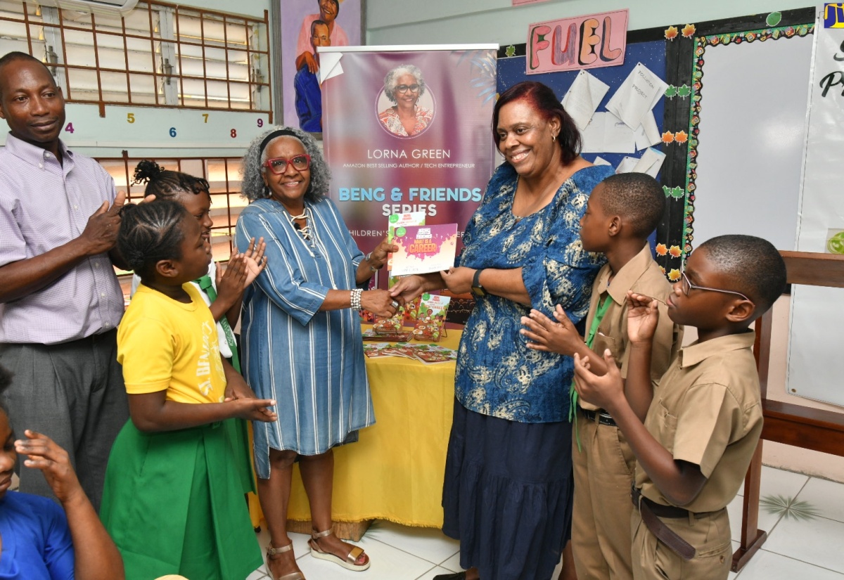 Author of the three-part series Beng & Friends, Lorna Green (fourth left), presents copies of her books to Principal, St. Benedict's Primary School, Jacqueline Carter Dixon (third right), during a visit to the institution in Kingston on December 4. Sharing in the presentation (from left) are President of the school’s Parent-Teacher Association, Kevin Allen; and students Komoya McKenzie, Shaniella Grant, Jared Russell and Aja Bailey. The Beng & Friends series seeks to educate students about Science, Technology, Engineering, and Mathematics (STEM) education and related jobs.