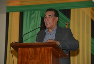 Minister of State in the Office of the Prime Minister (West), Hon. Homer Davis, addresses the second staging of the Sam Sharpe Flames of Freedom Lecture at the Montego Bay Cultural Centre in Montego Bay, St. James, on December 14.

