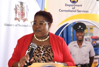 Chief Technical Director at the Ministry of National Security, Shauna Trowers, delivers the keynote address on behalf of the Minister of State, Hon. Juliet Cuthbert-Flynn, at a graduation ceremony held at the South Camp Adult Correctional Centre in St. Andrew today (November 30).
