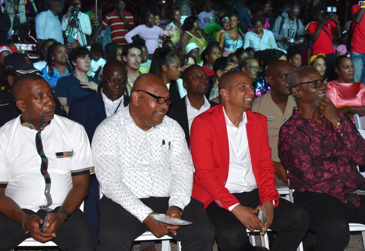 Minister of Local Government and Community Development, Hon. Desmond McKenzie (right) along with (from left) Minority Leader in the Kingston and St. Andrew Municipal Corporation (KSAMC), Councillor Andrew Swaby; Deputy Mayor, Councillor Winston Ennis; and Mayor of Kingston, Senator Councillor Delroy Williams, participate in the KSAMC's annual Christmas Tree Lighting ceremony and concert at the St. William Grant Park, downtown Kingston on December 14.