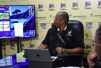 Rural Agricultural Development Authority (RADA) Senior Programmer and one of the creators of the RADA Mobile App, Hartnell Campbell, speaks during a Jamaica Information Service (JIS) ‘Think Tank’ at the Agency’s Head Office in Kingston on Thursday (December 7).

