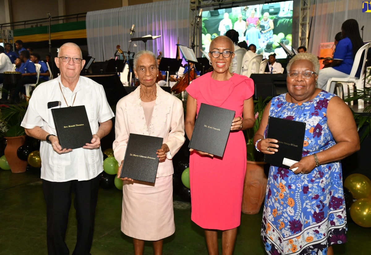 Minister of Education and Youth, the Hon. Fayval Williams (second right) with former Ministers of Education (from left) Rev. Ronald Thwaites; Dr. Mavis Gilmour Peterson; and Maxine Henry Wilson, during a special forum to honour former Ministers of Education during the Forum for Innovations in Teaching (FIT3), held at the National Arena in Kingston on Friday (January 26).