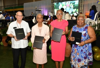 Minister of Education and Youth, the Hon. Fayval Williams (second right) with former Ministers of Education (from left) Rev. Ronald Thwaites; Dr. Mavis Gilmour Peterson; and Maxine Henry Wilson, during a special forum to honour former Ministers of Education during the Forum for Innovations in Teaching (FIT3), held at the National Arena in Kingston on Friday (January 26).