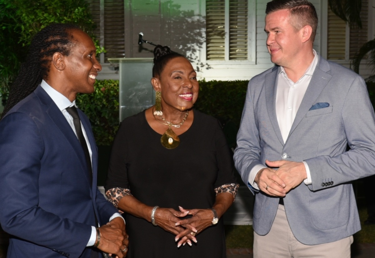 Minister of Culture, Gender, Entertainment and Sport, Hon. Olivia Grange, converses with World Anti-Doping Agency (WADA) President, Witold Bańka (right), during the third annual WADA Forum with Ministers of Sports in the Caribbean. The event was held on Tuesday (January 16) at Devon House in Kingston. At left is State Minister in the Ministry of Foreign Affairs and Foreign Trade, Hon. Alando Terrelonge. 