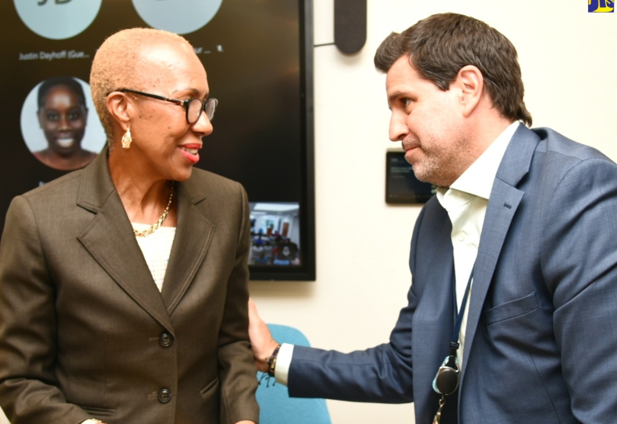 Minister of Education and Youth, Hon. Fayval Williams, converses with Chief of Operations, Inter-American Development Bank (IDB), Lorenzo Escondeur, during the IDB’s Financial Management Pilot School Sensitisation Forum on Thursday (January 18). The event was held at the IDB’s Country Office on Montrose Road in Kingston.

