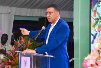 Prime Minister, the Most Hon. Andrew Holness.


