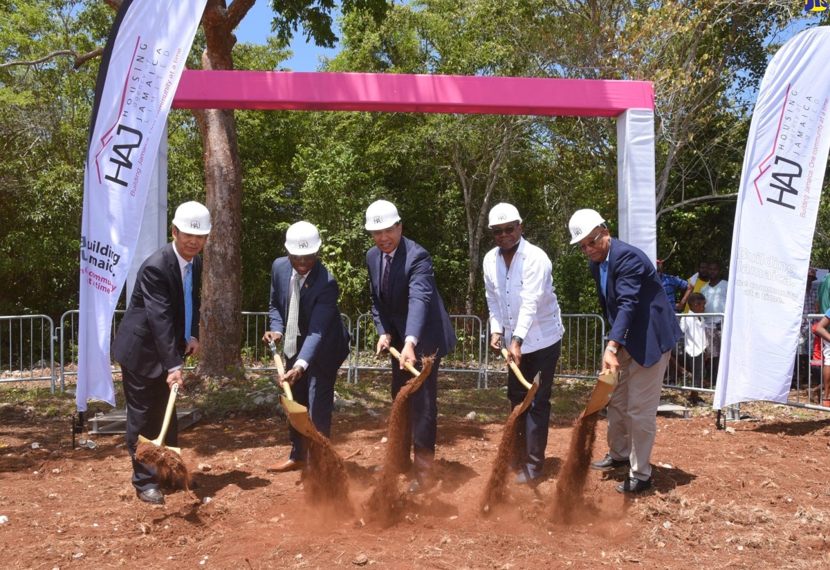 Prime Minister, the Most Hon. Andrew Holness (centre), and Tourism Minister, Hon. Edmund Bartlett (second right), broke ground for the Rhyne Park Estate housing development in St. James in 2019, providing 754 housing solutions for low and middle-income workers, including persons employed to the attractions and accommodations sector. Others (from left) are General Manager, Henan Fifth Construction Group, Baoguo Chen; then Minister without portfolio in the Ministry of Economic Growth and Job Creation, Hon. Pearnel Charles Jr.; and Chairman of the Housing Agency of Jamaica (HAJ), Norman Brown.