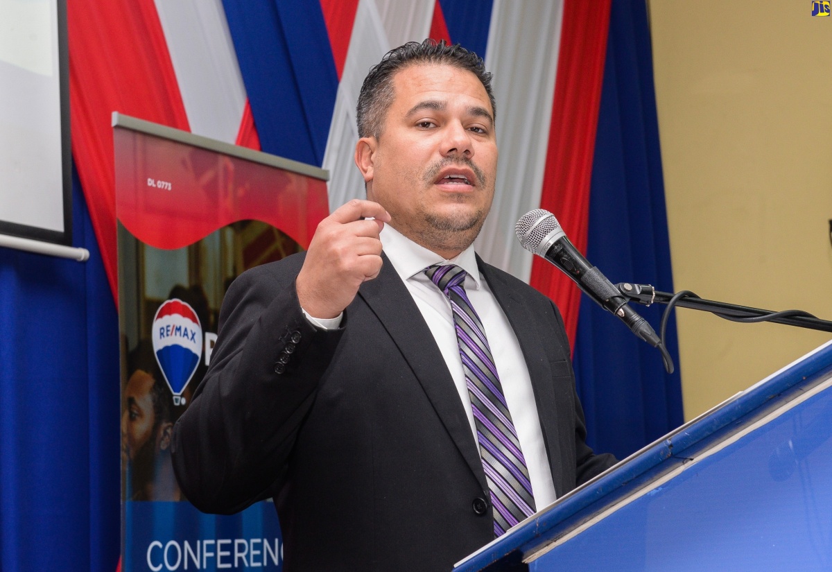Minister without Portfolio in the Ministry of Economic Growth and Job Creation, Senator the Hon. Matthew Samuda, delivers the keynote address during the launch of the RE/MAX Jamaica Conference and Expo at the University of the Commonwealth Caribbean on Wednesday (January 17).