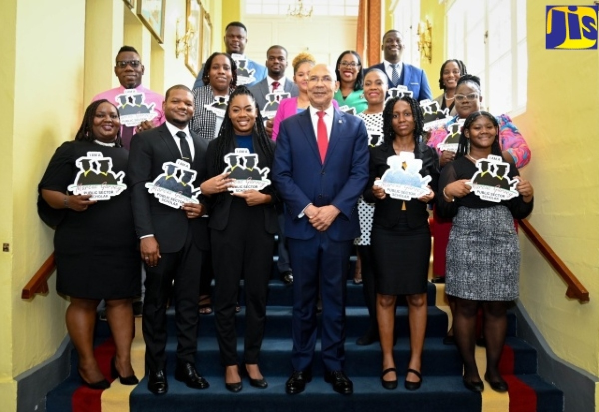 Governor-General, His Excellency the Most Hon. Sir Patrick Allen (front row, third right), is flanked by the 2023 recipients of the Marcus Garvey Public Sector Scholarship during the awards ceremony at King’s House on August 17. Nineteen public-sector employees have been awarded scholarships to pursue masters or doctoral studies at an approved local and or international university.

