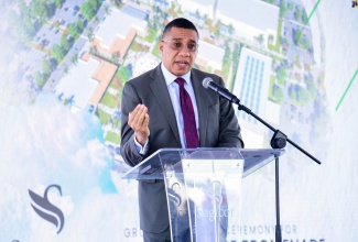 Prime Minister, the Most Hon. Andrew Holness, delivers the keynote address at the ground-breaking ceremony for Sagicor’s $8-billion Portmore Promenade, in the Greater Bernard Lodge area of St. Catherine, on February 7.

