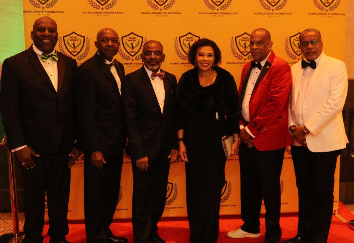 Jamaica’s Ambassador to the United States, Her Excellency Audrey Marks (third right), is surrounded by members of the David “Wagga” Hunt Foundation at the organisation’s 10th annual fundraising gala in Washington DC on February 17. They are (from left) Garth Pottinger, Loxley O’Connor, Lloyd Anderson, Chairman of the Foundation, Christopher Hunt,  and Arnold “Dullo” McDonald.