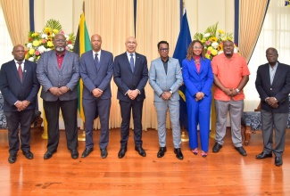 Governor-General, His Excellency the Most Hon. Sir Patrick Allen (fourth left), shares a photo opportunity with the new team of executives from the Jamaica Confederation of Trade Unions (JCTU) during a courtesy call at King's House on February 20. They are (from left) board member, Clarence Frater; Vice President, Rodolph Thomas; President, St Patrice Ennis;  Vice President, Granville Valentine; Vice President, Techa Clarke-Griffiths; Assistant General Secretary, Khurt Fletcher; and Assistant General Secretary, Clifton Grant . 


