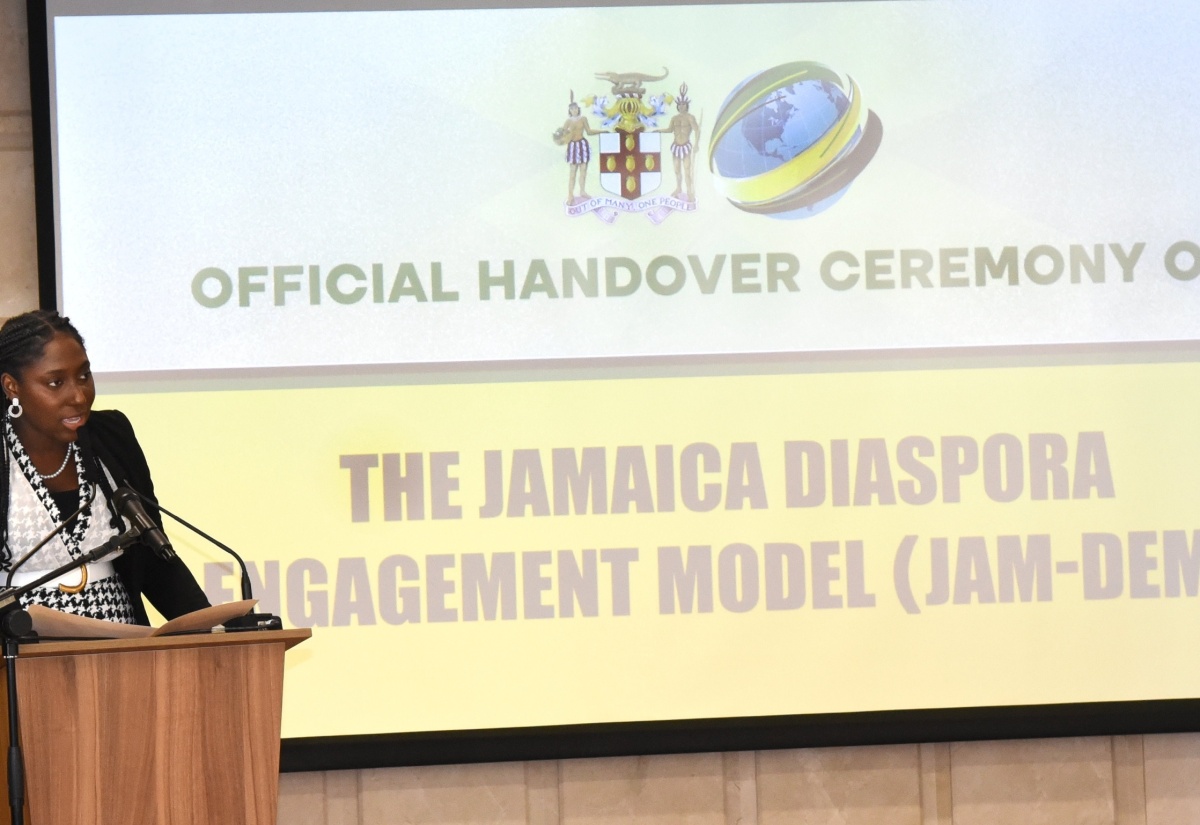 Project Manager with the International Organization for Migration (IOM), Krystal Lofters addresses the recent handover ceremony for the Jamaica Diaspora Engagement Model (JAM-DEM) at the Ministry of Foreign Affairs and Foreign Trade in downtown Kingston.


