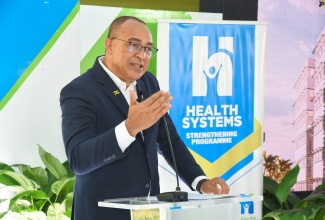 Minister of Health and Wellness, Dr. the Hon. Christopher Tufton, addresses the recent ground-breaking ceremony for the redevelopment of the Spanish Town Hospital in St. Catherine.

