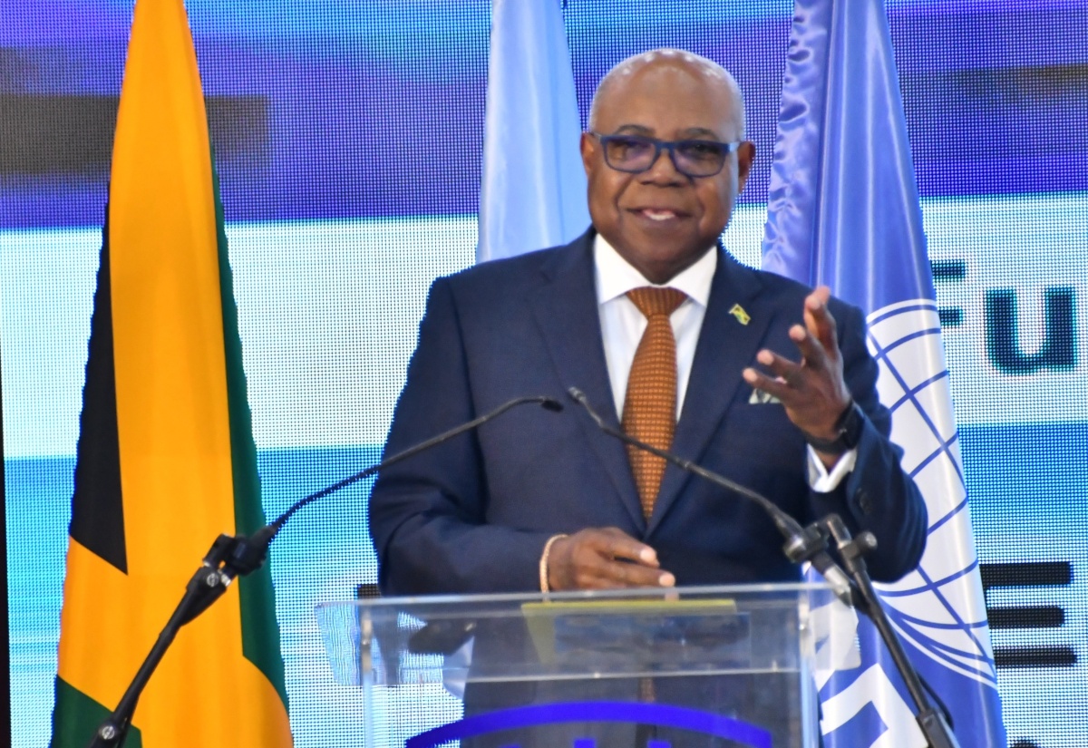 Minister of Tourism, Hon. Edmund Bartlett, addresses the second day of the Global Tourism Resilience Day Conference at the Montego Bay Convention Centre in St. James, on Saturday (February 17). 