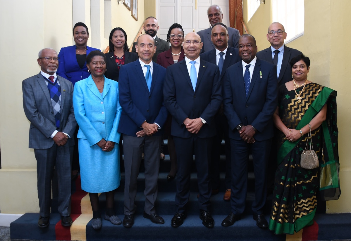 Governor-General, His Excellency the Most Hon. Sir Patrick Allen (third right), is surrounded by the new executive team of the Jamaica Employers’ Federation, led by President Wayne Chen (third left), during a courtesy call at King’s House on February 8.

