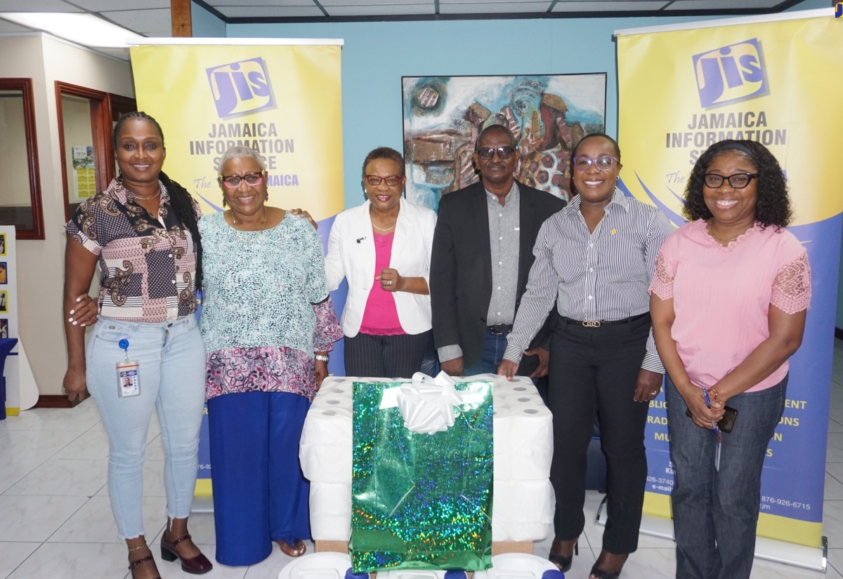 Chief Executive Officer, Jamaica Information Service (JIS), Enthrose Campbell (third left), is joined by members of the Agency’s Finance Department - Stores Officer, Maureen Green (left), Finance Manager, Glenford West (third right), and Accounts Supervisor, Nadia Spaulding-Lindo (right), after handing over donations from Action Chemical and Equipment and IJASS Trading Limited to the Mount Olivet Boys’ Home. The presentation was made the Agency’s Head Office in Kingston on March 1. Sharing the moment are Company Secretary and Director, Action Chemical and Equipment, Marva Bernard (second left), and Board Chair and Interim Director, Mount Olivet Boys’ Home, Sophia Morgan.

