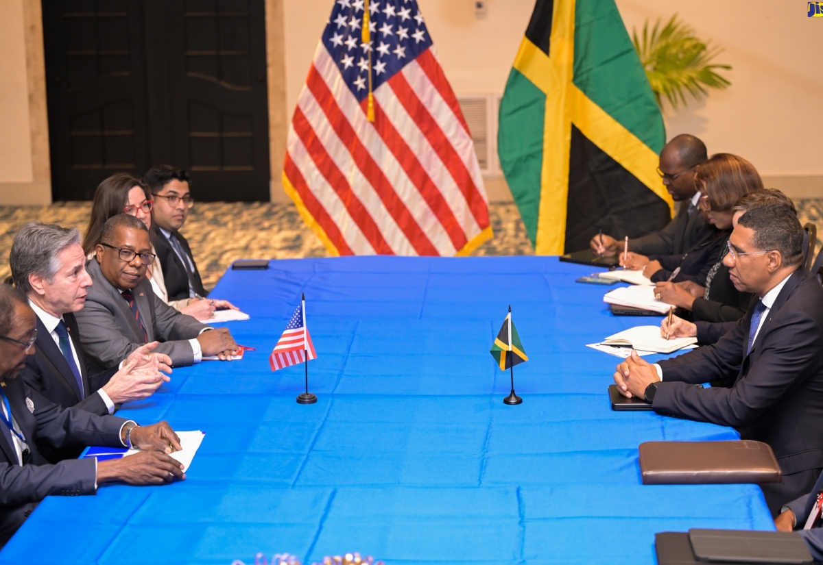 Prime Minister, the Most Hon. Andrew Holness (right), listens to remarks by United States Secretary of State, Antony Blinken (second left), during a Bilateral meeting at The Jamaica Pegasus hotel in New Kingston on Monday (March 11).

