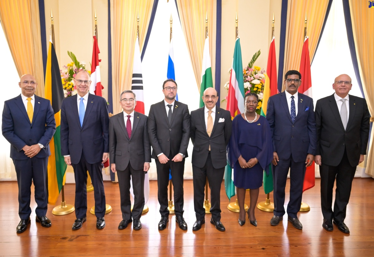 Governor-General, His Excellency the Most Hon. Sir Patrick Allen (left), pauses for a photo opportunity with Ambassadors-Designate following the Group Presentation of Credentials at King’s House on Tuesday (March 12).