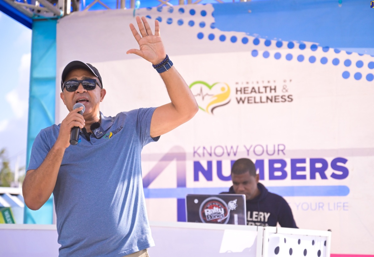 Minister of Health and Wellness, Dr. the Hon. Christopher Tufton, addresses residents during the ‘Know Your Numbers’ road show in Mandeville, Manchester on Friday (March 22).