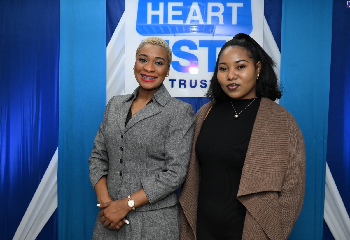 Managing Director, HEART/NSTA Trust, Dr. Taneisha Ingleton (left), shares a photo opportunity with TVET Ambassador, Melissa Moses, during Thursday’s (February 29) launch of the entity’s TVET Ambassador Programme. The launch was held at the HEART/NSTA Trust’s offices on Oxford Road in St. Andrew. 