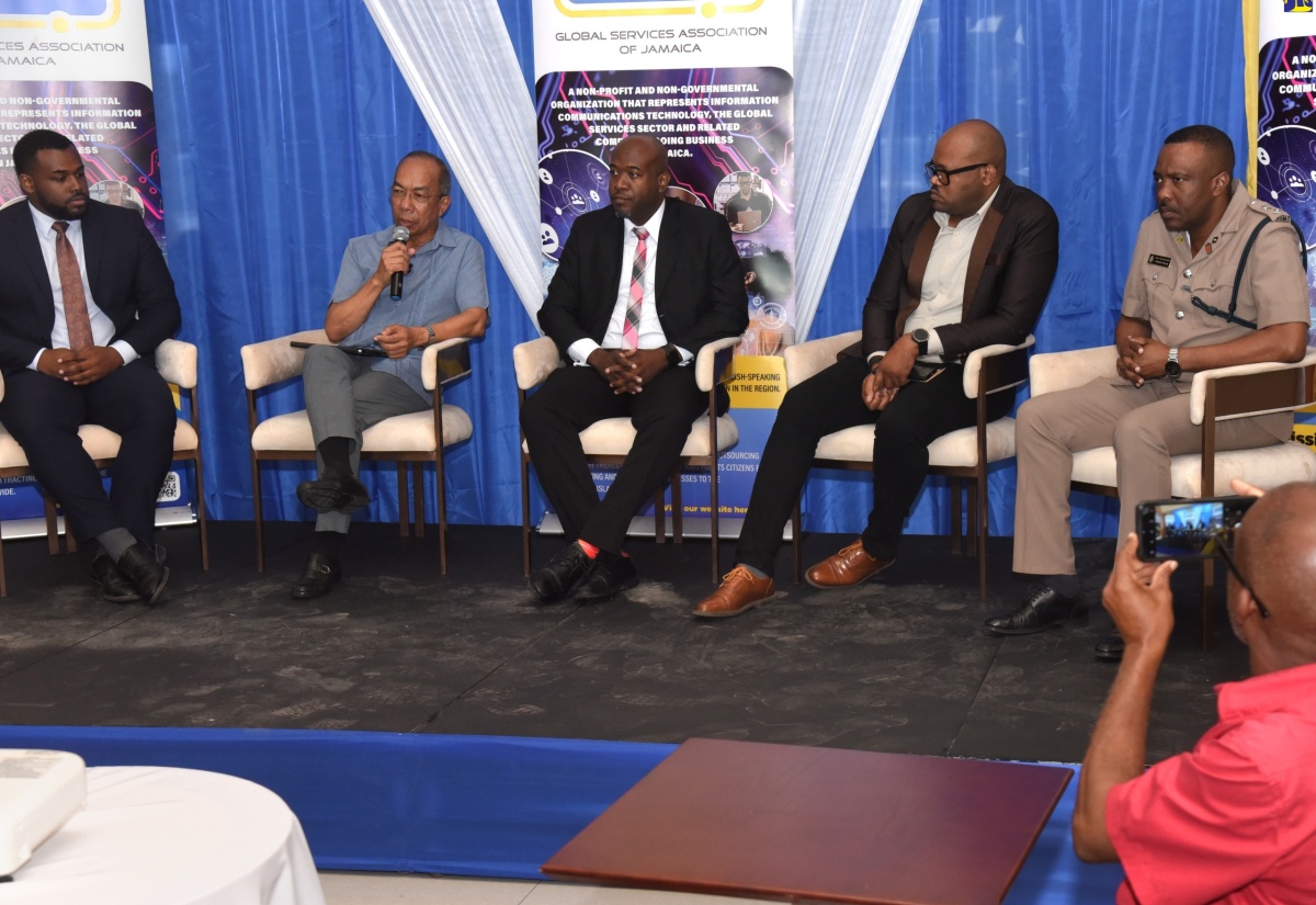 Deputy Prime Minister and Minister of National Security, Hon. Dr. Horace Chang (second from left), participates in a panel discussion during the Global Services Association of Jamaica (GSAJ) President’s Breakfast Forum in Montego Bay on Thursday (February 29). Listening (from left) are Attorney-at-Law, Jezeel Martin; Information Systems Manager in the Office of the Information Commissioner, Ronald Frue; Communications Officer of the Jamaica Constabulary Force (JCF) Forensics and Cybercrime Division, Deputy Superintendent of Police, Maurice Goode; and Acting Assistant Commissioner of Police (ACP) for Area One, Vernon Ellis.

