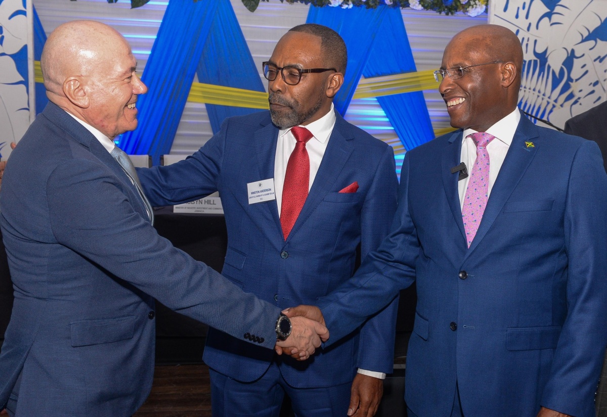 Minister of Industry, Investment and Commerce, Senator the Hon. Aubyn Hill (right), exchanges greetings with Head of Cooperation,  European Union (EU) Delegation to Jamaica, Aniceto Ruiz (left), while Judge of the Caribbean Court of Justice (CCJ), Hon. Justice Anderson, shares in the moment. Occasion was the CARIFORUM Intellectual Property Rights and Innovation Case law Conference for the CARIFORUM Region, Mercosur and Chile, held recently at the Spanish Court Hotel in Kingston.

