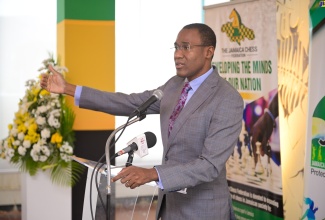 Minister of Finance and the Public Service, Dr. the Hon. Nigel Clarke, addresses the handover of grants valued at $42.35 million to support sports development, during a ceremony on Wednesday (March 20) at the Ministry of Culture, Gender, Entertainment and Sport in New Kingston.

