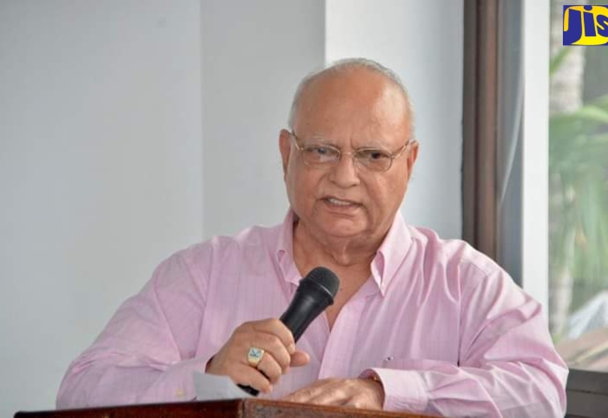 Owner of Gem Palace Duty Free Stores and St. Ann Businessman, Kumar Sujanani, announcing the donation of 25 new computers to the Ocho Rios Primary School at the Almond Tree Restaurant, Ocho Rios, St. Ann, on March 5.  

