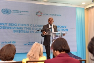 Minister of Labour and Social Security, Hon. Pearnel Charles Jr., addresses Wednesday’s (April 24) United Nations Joint Sustainable Development Goals (SDG) Fund Closing Ceremony, held at the Courtyard by Marriott Hotel in Kingston. 