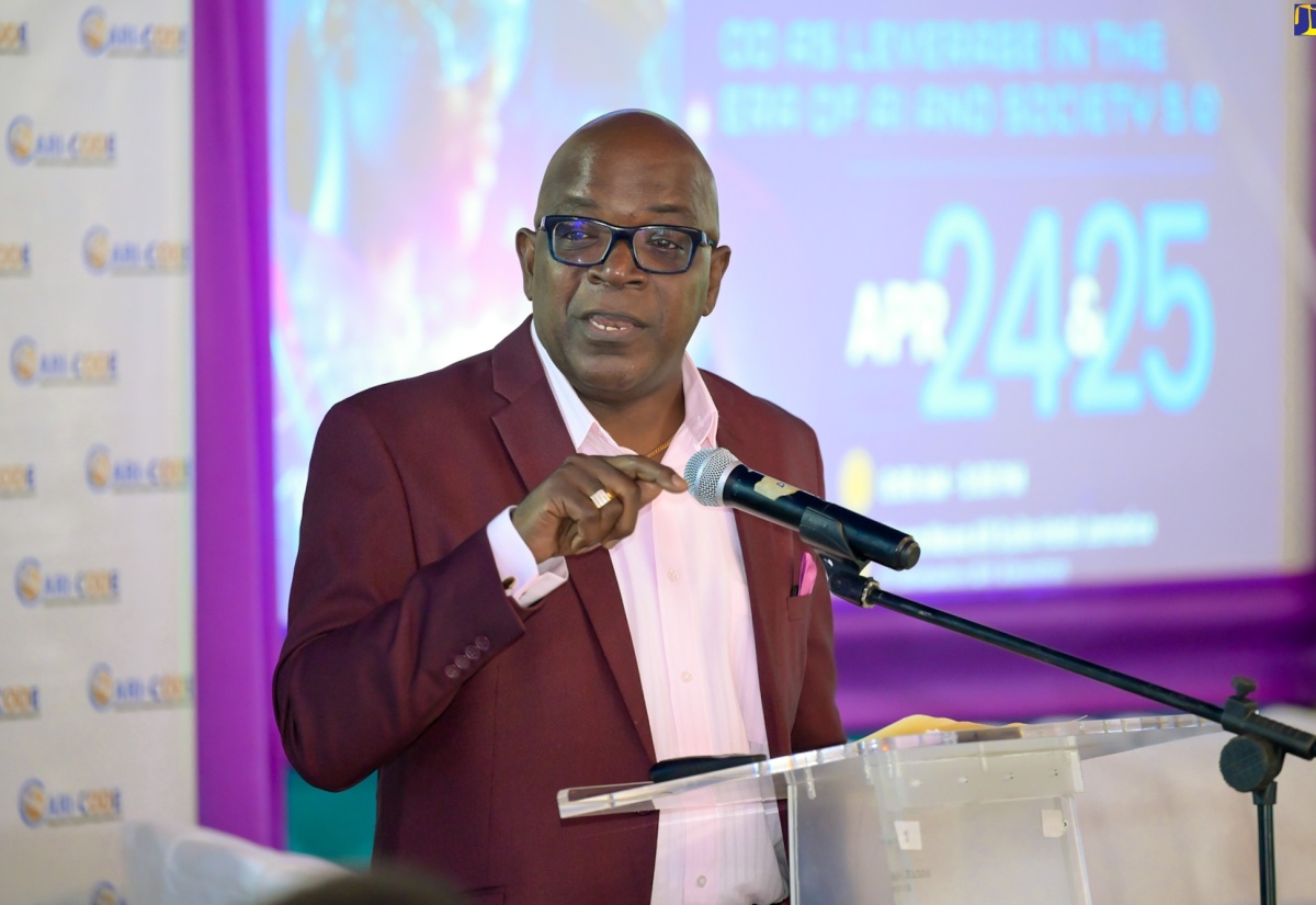 Deputy Financial Secretary in the Ministry of Finance and the Public Service, Wayne Jones, makes a presentation on public-sector transformation, at the opening of the fourth Organisation Development Transformation Conference, hosted by the Caribbean Centre for Organisation Development Excellence (CARI-CODE),  at the Terra Nova All-Suite Hotel in St. Andrew on Wednesday (April 24). The two-day event was held under the theme ‘BEYOND TOMORROW – Organisation Development as Leverage in the era of Artificial Intelligence and Society 5.0’ and featured local and international presenters.