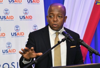 Minister of Labour and Social Security, Hon. Pearnel Charles Jr., addresses Tuesday’s (April 23) United States Agency for International Development (USAID) Positive Pathways Private Sector Forum, held at The Jamaica Pegasus hotel in New Kingston.

