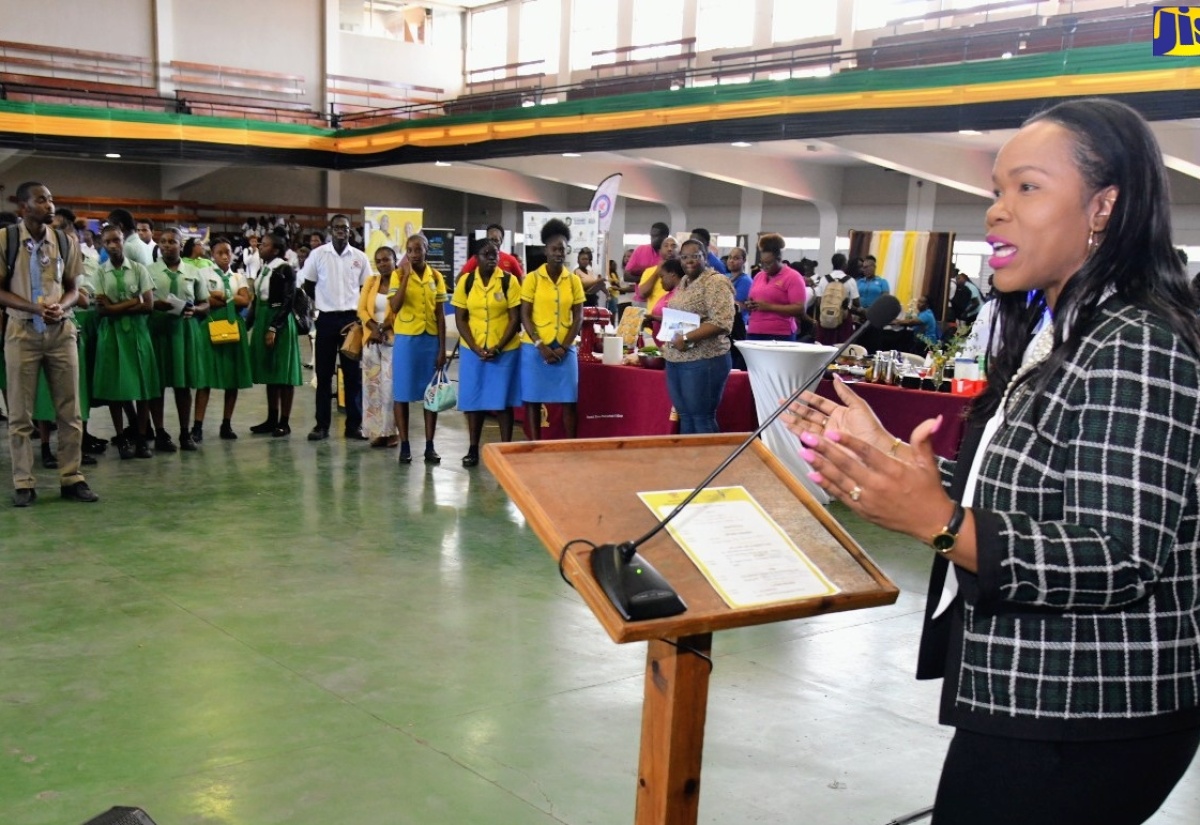Permanent Secretary in the Ministry of Education and Youth, Dr. Kasan Troupe, addresses students during the opening ceremony for the Ministry’s second Tertiary Education Recruitment Drive at the National Stadium on Friday (April 26).

