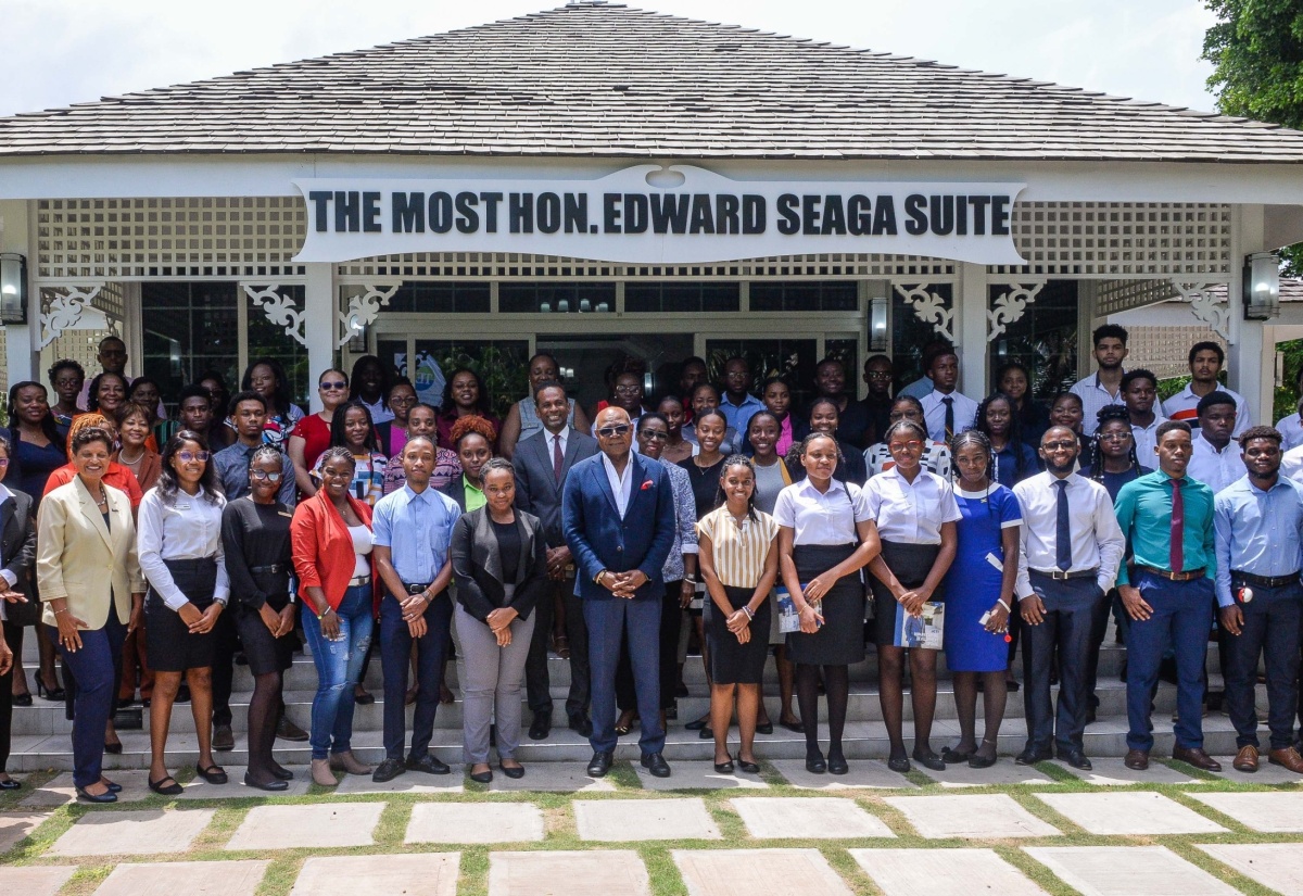Minister of Tourism, Hon. Edmund Bartlett (centre), with tourism officials, representatives of companies and interns who participated in the 2023 Tourism Enhancement Fund (TEF) Summer Internship Programme.