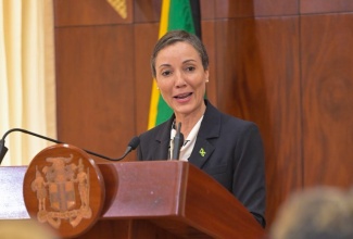 Minister of Foreign Affairs and Foreign Trade, Senator the Hon. Kamina Johnson Smith, addresses a post-Cabinet press briefing at Jamaica House, on April 17.

