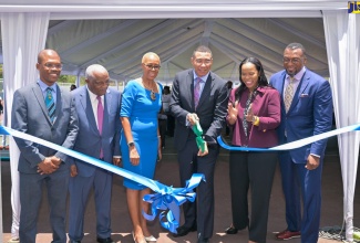 Prime Minister, the Most Hon. Andrew Holness (fourth left), cuts the ribbon to officially open the STEMxpo at the Future Ready International Conference at the University of Technology (UTech)  in Kingston on April 24. Also sharing in the moment are (from left) President, UTech, Dr. Kevin Brown; Chairman, JaSTEM for Growth Foundation, Glen Christian; Minister of Education and Youth, Hon. Fayval Williams; Permanent Secretary in the Ministry, Dr. Kasan Troupe; and Founder and CEO, 21stCentEd., Marlon Lindsay.