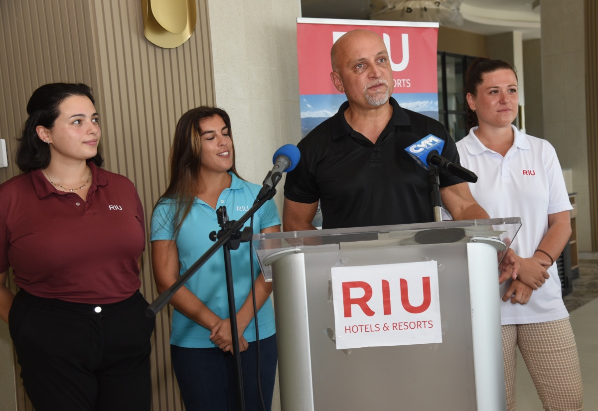 RIU Regional Director, Jamaica, Frank Sondern, addresses the media, following a walkthrough of the new RIU Aquarelle Trelawny Resort, on Thursday April 11, 2024. Others (from left) are Assistant General Manager, Belen Alvarez; Assistant General Manager, Food and Beverage, Carla Santana, and General Manager, Paola Garcia.

